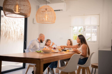 Family Enjoying Breakfast Together at Home