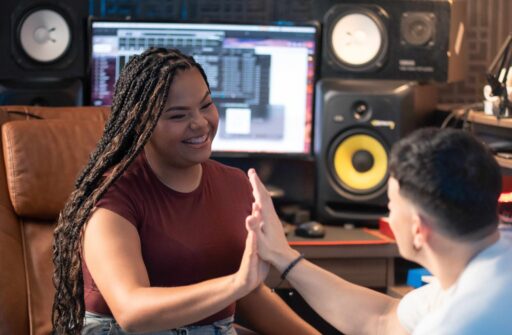 Family music studio high five celebration